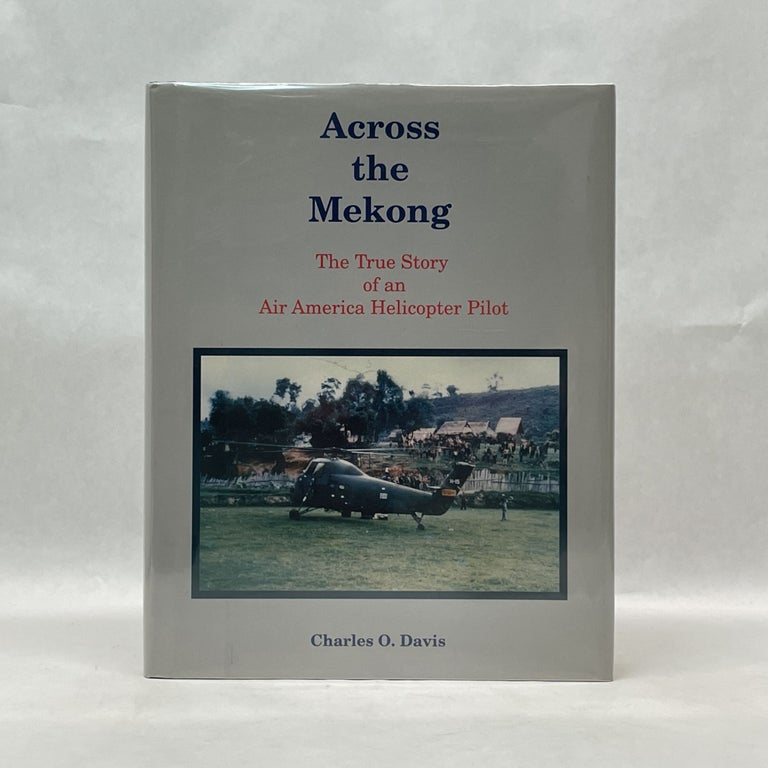 Item #50927 ACROSS THE MEKONG: THE TRUE STORY OF AN AIR AMERICA HELICOPTER PILOT. Charles O. Davis.