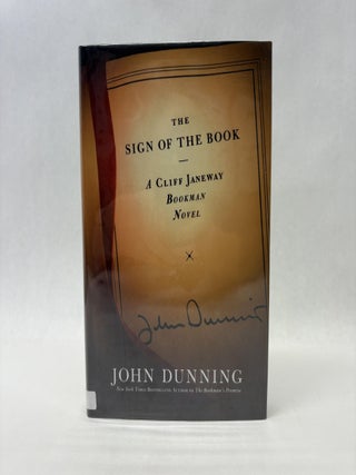 Item #56057 THE SIGN OF THE BOOK. John Dunning
