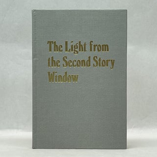 THE LIGHT FROM THE SECOND STORY WINDOW